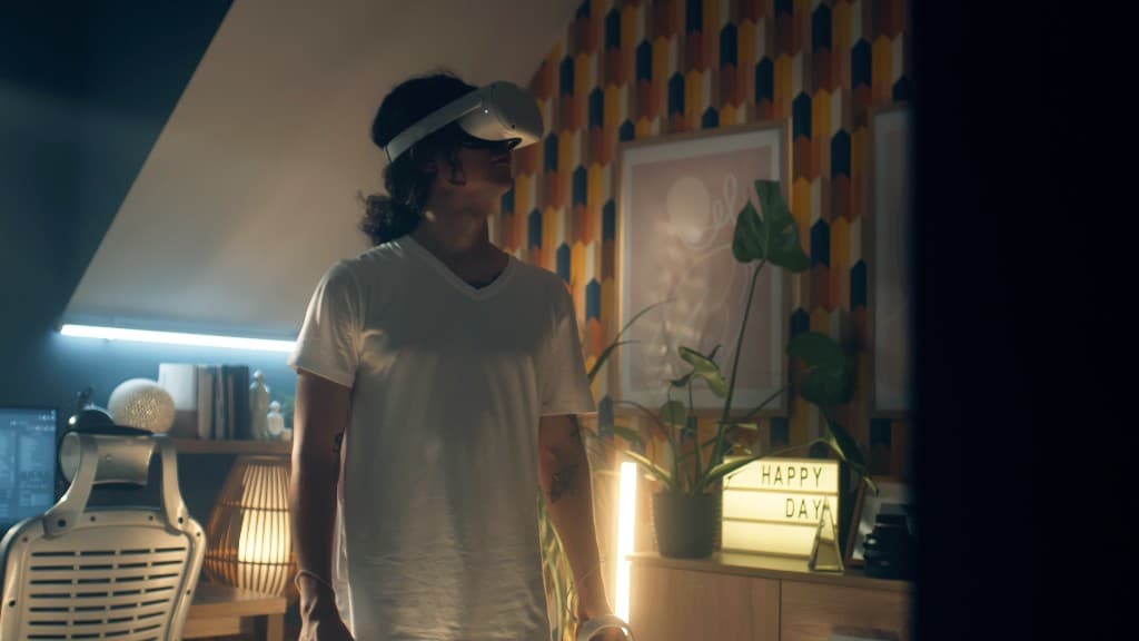 A person wearing a VR headset in the Autodesk commercial